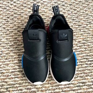 Adidas Youth NMD Black with Blue and red Size 2 slip on sneakers. Gently used.